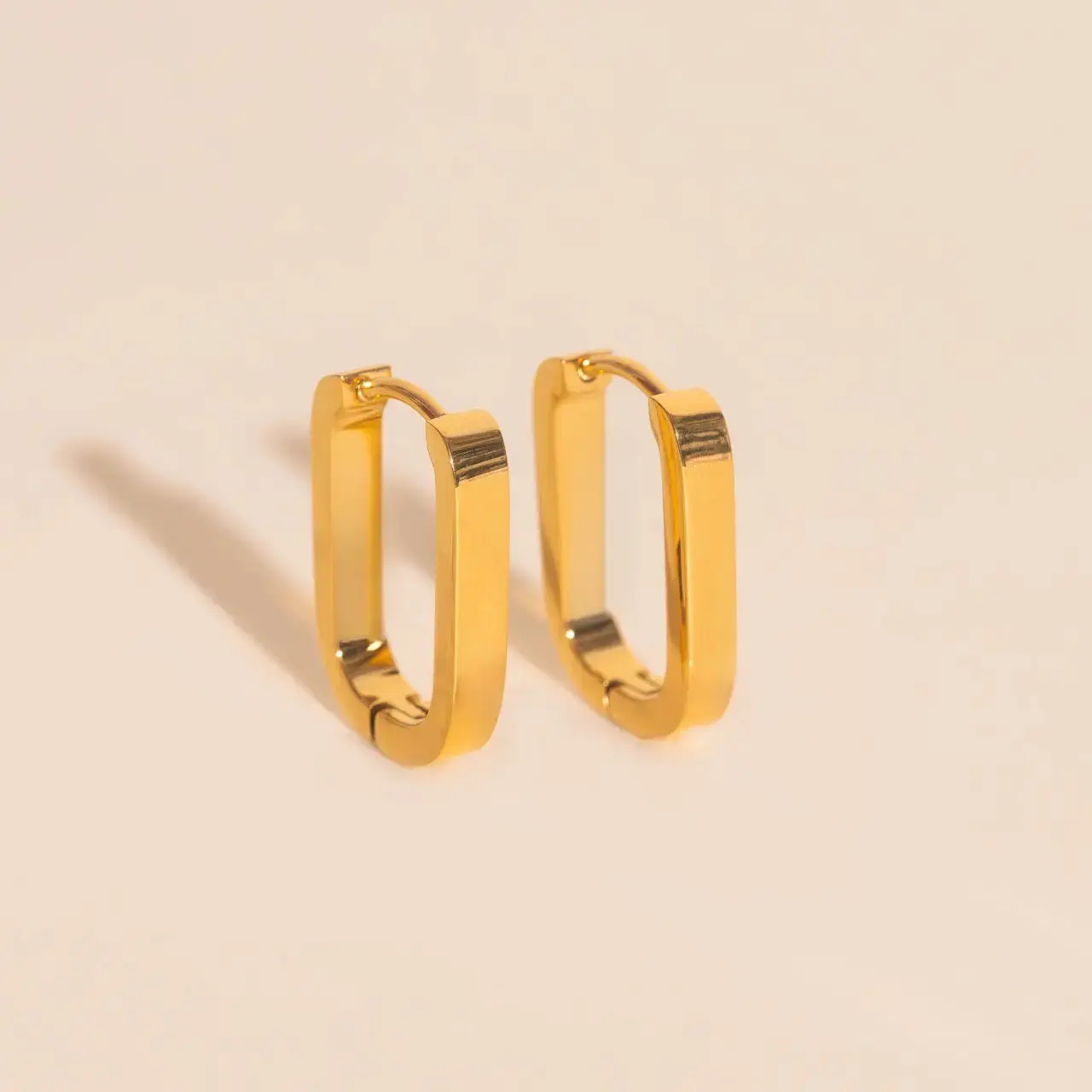 Female Smooth Oblong Huggie Hoop Earrings - Titanium, Gold, Platinum, Irritation-Free Costume Jewelry, Daily, No Warning Applicable