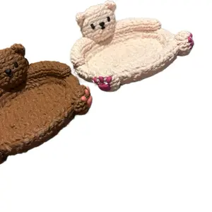 Matching knitted bear coasters
