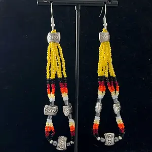 A pair of Navajo handmade beaded earrings adorned with golden sun yellow seed beads, fire designed seed beads, hematite and silver plated square basket beads.