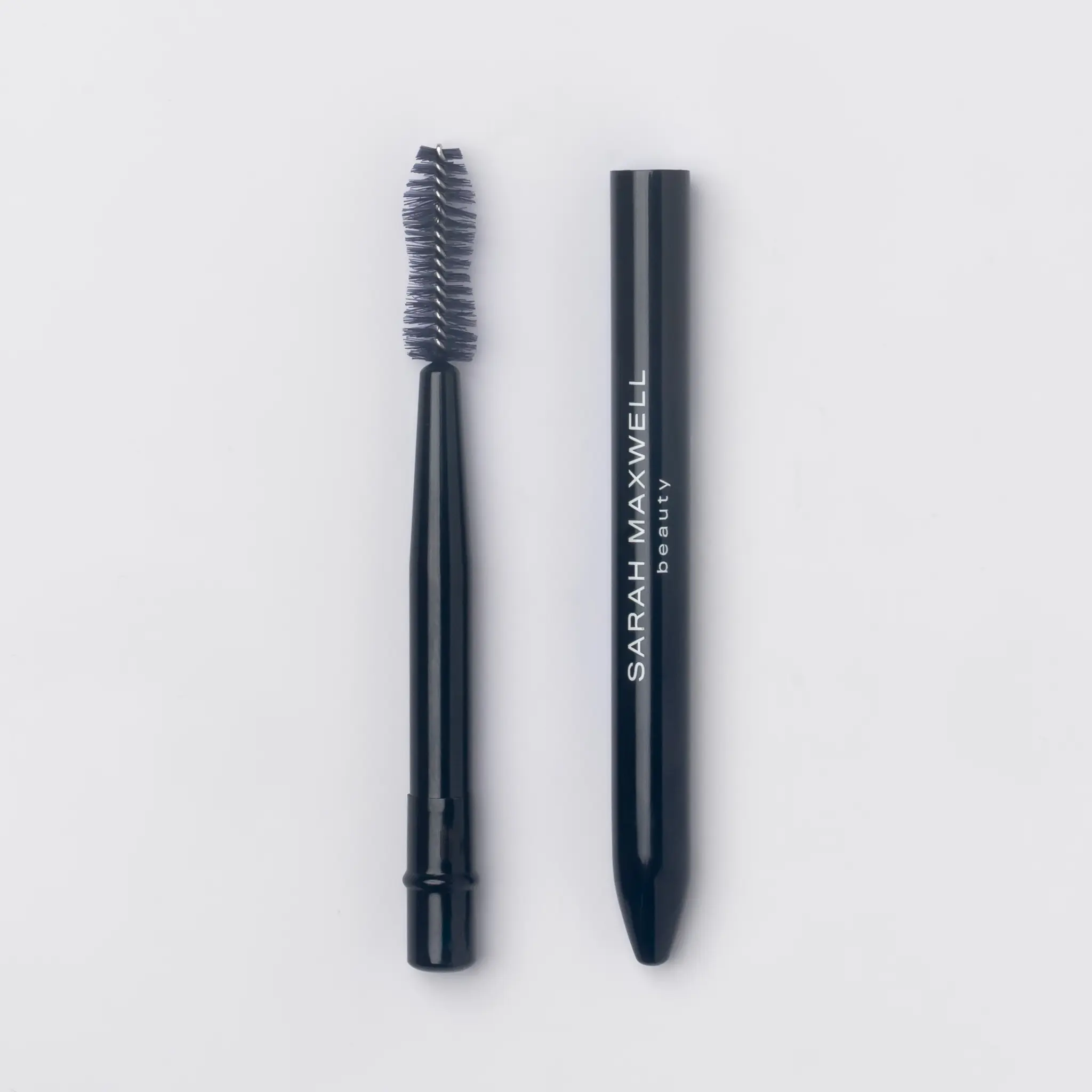 Sarah Maxwell Beauty - Lash and Brow Bounce Brush - Our Bounce Brush is a reusable lash and brow wand for quick and easy touch-ups