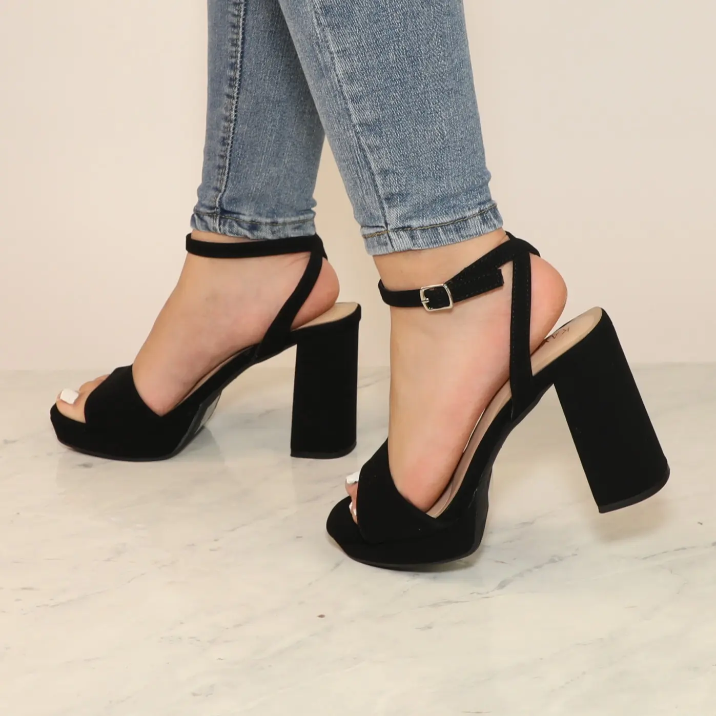 Lady high heel open toe, one strap, round toe, with a tall block heel and ankle strap with buckle
