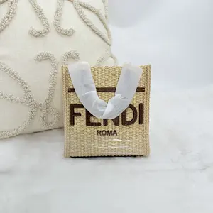 Pre-owned FENDI Mini Sunshine Shopper tote bag in raffia with brown leather trim. WWL