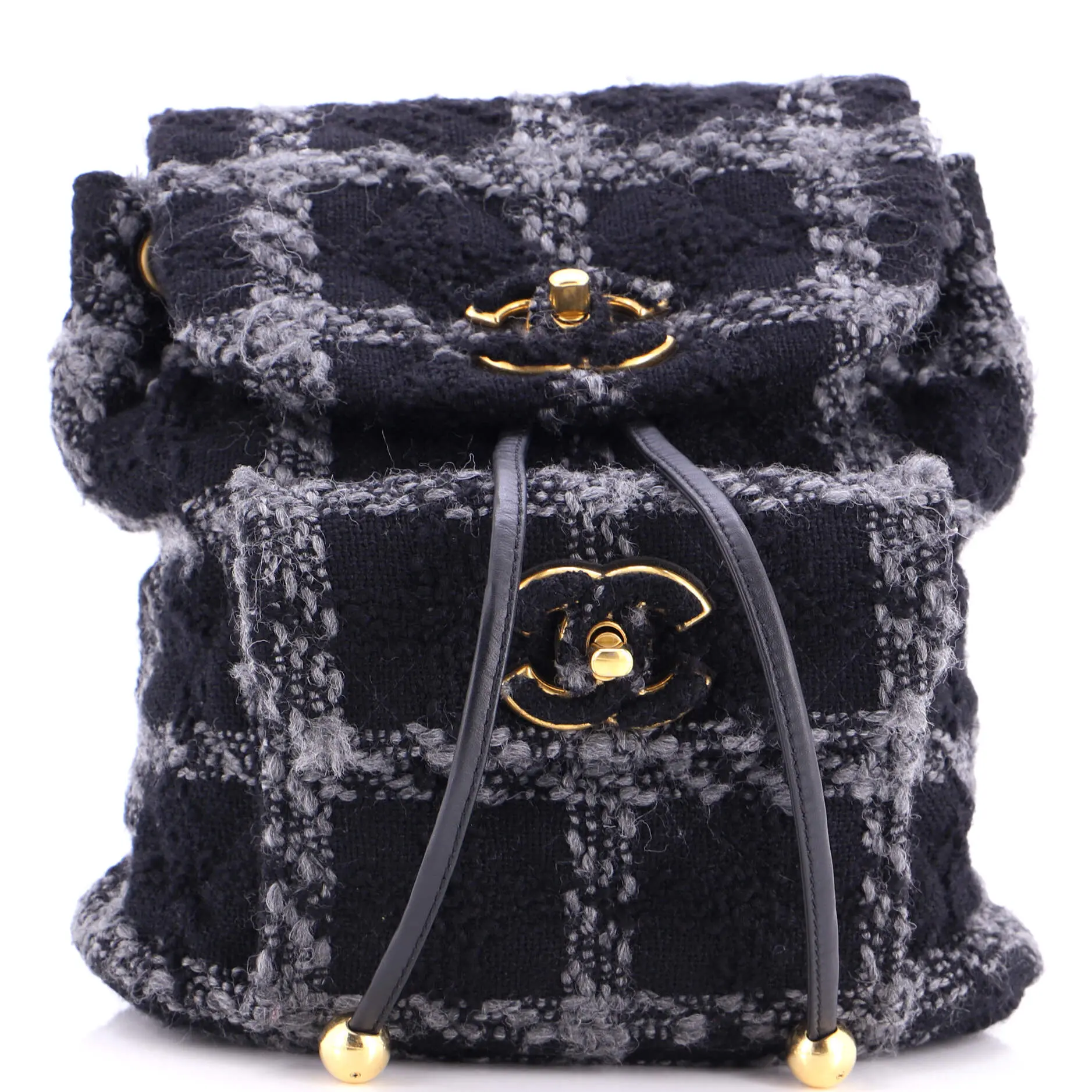 Pre-owned CHANEL Tweed, Wool Backpacks Duma Drawstring Backpack Quilted Wool Tweed Large by Rebag
