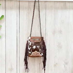 Cowgirl tooled leather & cowhide fringe crossbody bag 