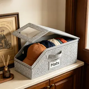 Protect your caps & snapbacks from crushing, dust & damage with this stackable hat organizer. Heavy-duty grey cardboard with clear flip-top lid, holds up to 12 caps. Ideal for closet, garage, car trunk & home use, keeps hats neat and well-protected.