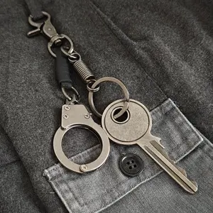 Vintage Handcuff & Key Keychain with Spring Rope, Trendy Outfit Accessory, Niche Bag Charm, Edgy Waist Hanger with Unique Design