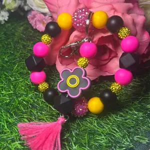 Neon bloom wristlet  keychain color scheme black, hot pink, yellow and bling beads made with wire