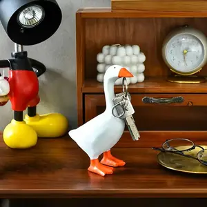Desk Goose 7 Inch Desktop Goose Statue Funny Goose Figurine for Office Table or Home Decorations Idea Valentine's Day and Easter gifts, toys, and decorative items