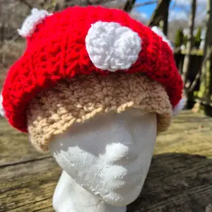 Handmade crocheted mushroom beanie. unisex mushroom beanie, perfect for casual wear. For both men and women. #mushroomcore aesthetic fits any outfit