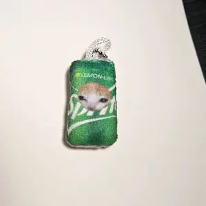 spwite sad cat keychain spwite sad cat keychain