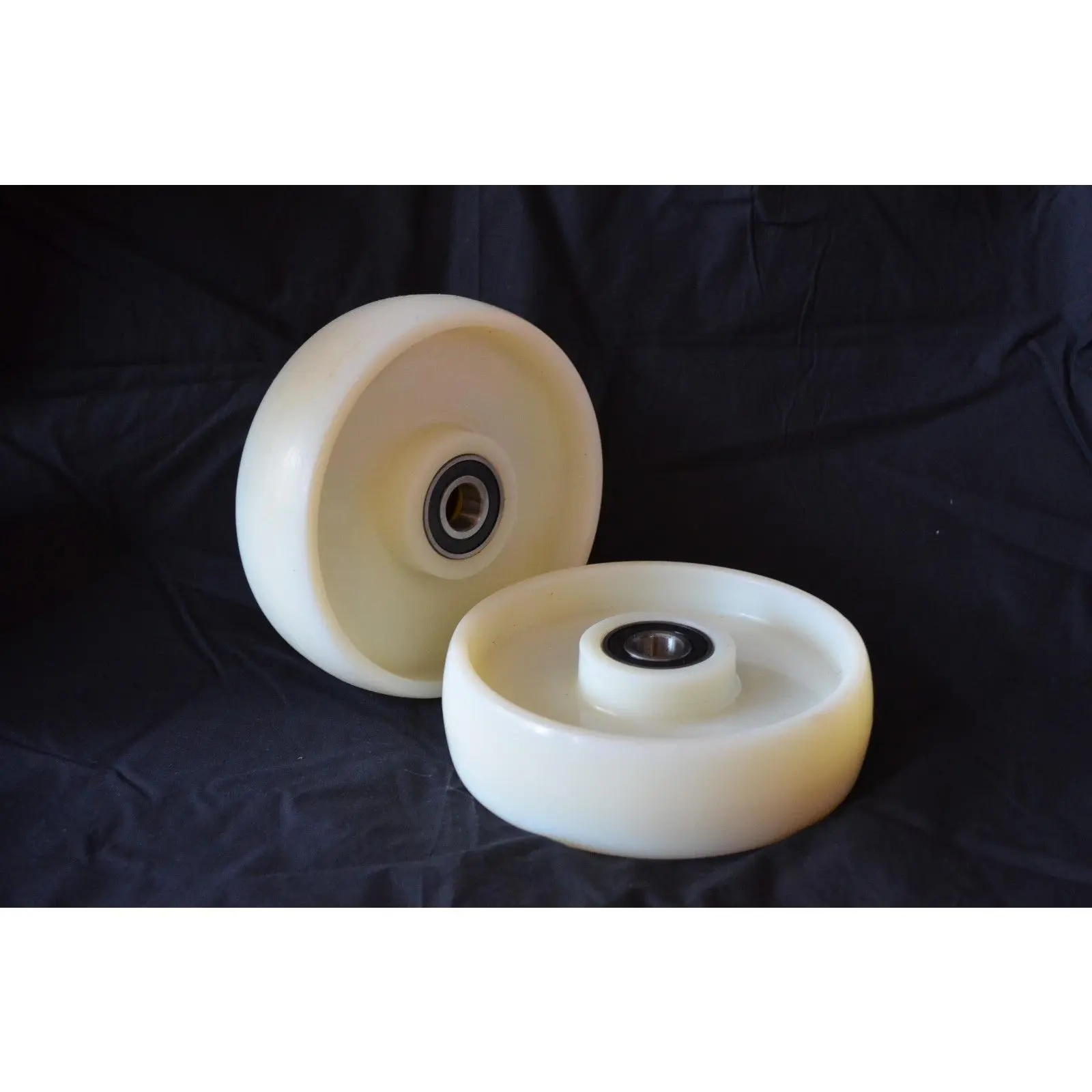 A Pair of Brand New Pallet Jack Steer Wheels With Bearings