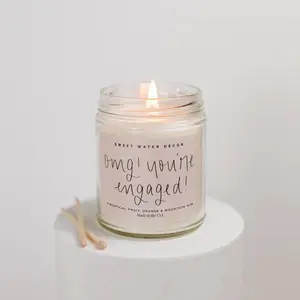 Sweet Water Decor OMG You're Engaged 9 oz Soy Candle with 40+ Hour Burn Time Tropical Fruit Orange & Mountain Air Scent Vegan Non-Toxic