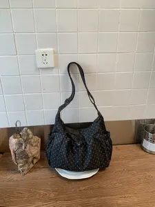 Large-capacity dotted print drawstring tote bag | Soft silhouette  dotted fabric + drawstring design, adjustable for single shoulder or crossbody wear. Perfect for daily commutes, school, grocery shopping, and more. It exudes a relaxed and gentle vibe an