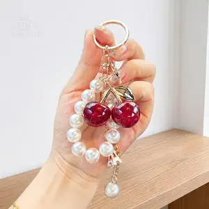 Cherry-Shaped Sparkling Pearl Resin Bag Charm with Glossy Finish, Handbag Clasps Clip for Handbags & Backpacks, Aesthetic Keychain Accessory, Valentine's Day Gift for Her with Fox Pendant & Mini Auto-Closure Fixer Pouch