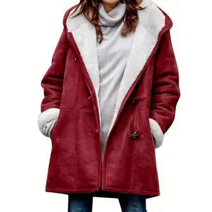 Oversized women’s winter coat with a plush collar and hooded design — thick and warm full-length coat with a button-front closure, soft plush lining, long sleeves, and pockets — casual yet elegant outerwear — new collection for autumn and winter 2025