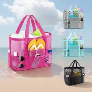 Large-capacity beach bag with mesh protection against sand. Multi-layered family beach bag for vacation and pool trips.
