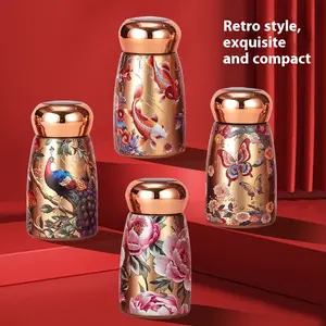 A Mini Chubby Cup with Koi Fish/Peacock/Peony Patterns – 316 Stainless Steel Vacuum Insulated Water Bottle. This portable on-the-go cup comes with a carry loop, a leak-proof design perfect for travel, and a 10-ounce capacity. Ideal for outdoor advent