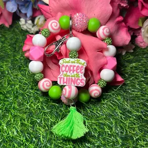 Coffee first wristlet keychain, color scheme green, pink, white and bling beads, made with wire