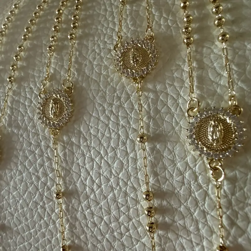 Colgante de la v.maria enchape 14k
