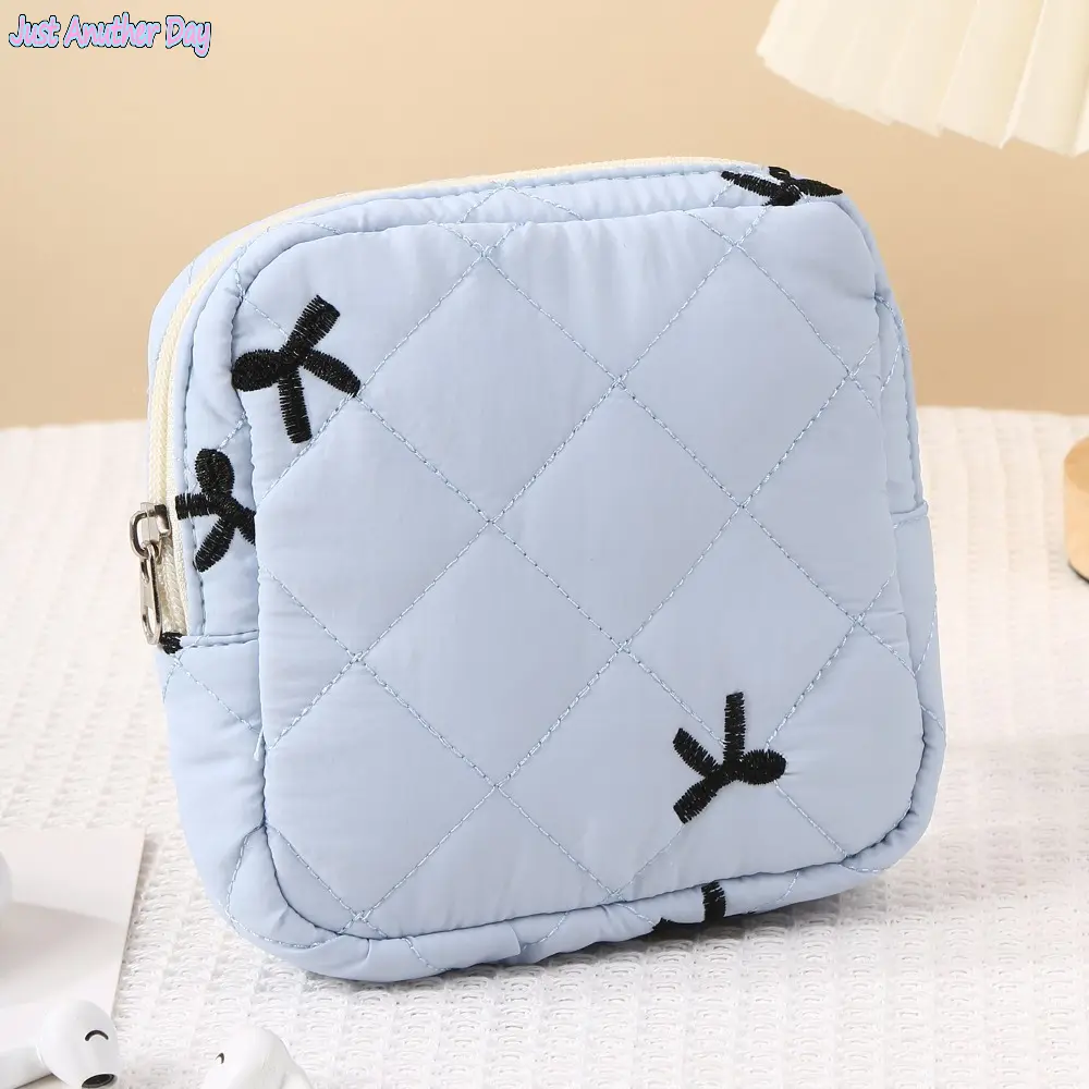 Floral Sanitary Pad Storage Pouch — Large Capacity, Portable, Cute Design — Versatile Bag for Sanitary Pads, Cosmetics, or Data Cables Floral Sanitary Pad Storage Pouch — Large Capacity, Portable, Cute Design — Versatile Bag for Sanitary Pads, Cosmetics, or Data Cables