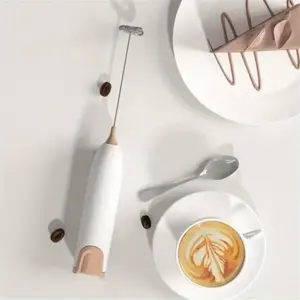 Mini electric milk frother: a handheld beverage frother that supports coffee, latte frothing, and egg mixing, with a portable and compact design suitable for daily kitchen use