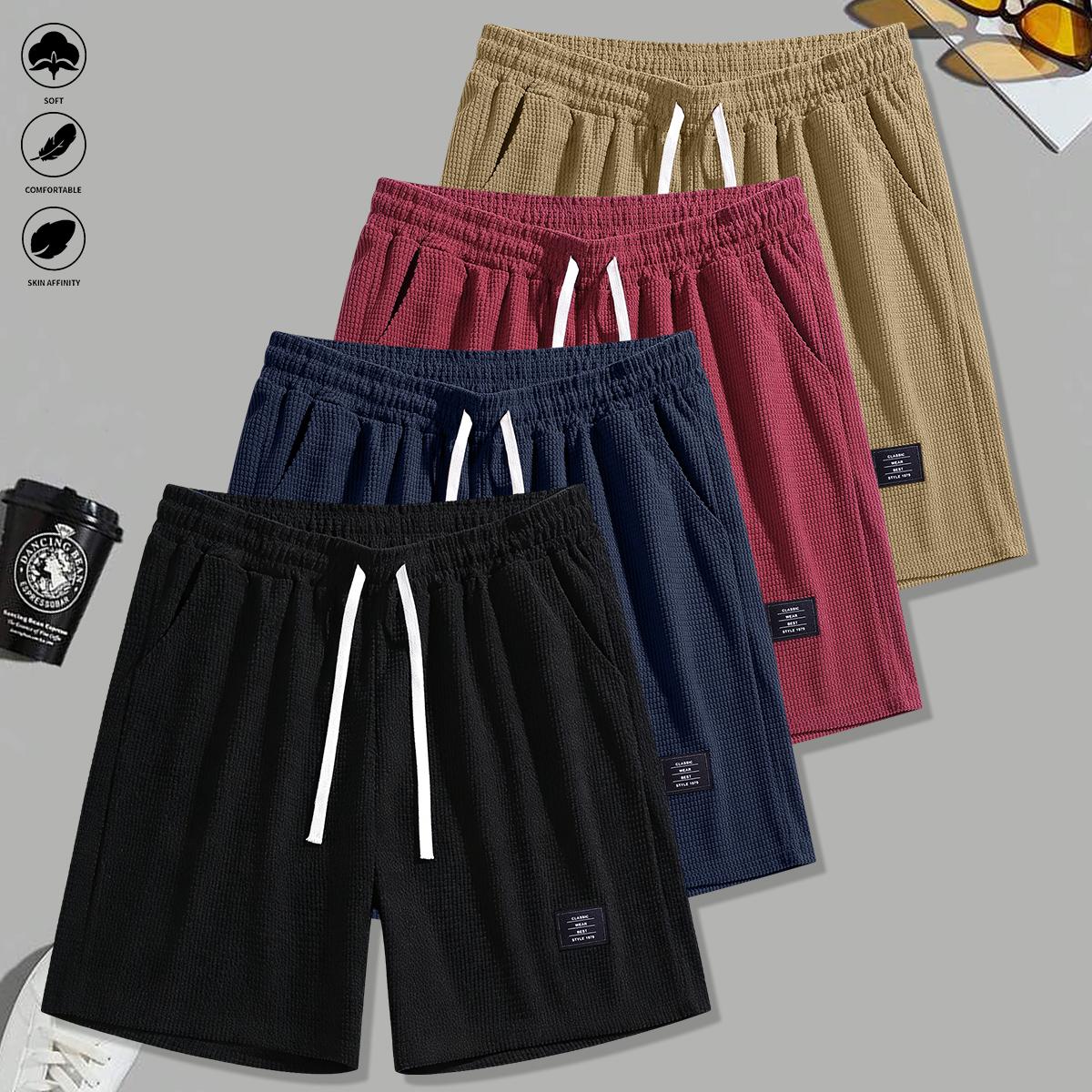 Set of 4 men’s summer new loose casual athletic shorts featuring an elastic waistband with drawstring adjustment, side pockets for convenient storage, knit fabric—ideal for running, workouts, outdoor activities, and everyday wear.