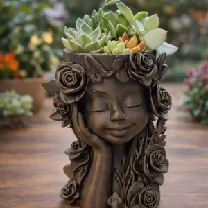 Girl statue planter