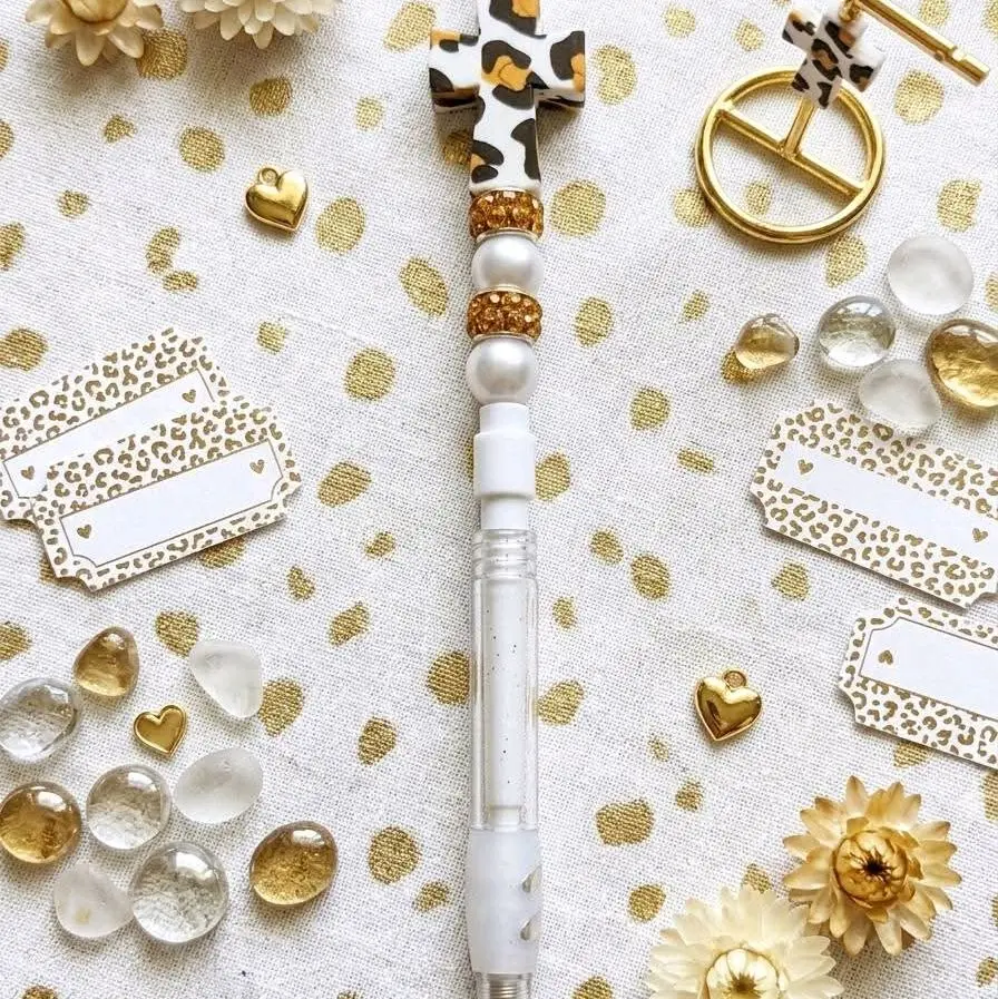 mechanical pencil with focal bead cowprint cross.