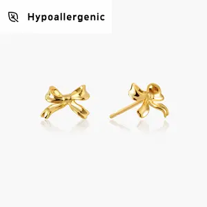 en route Gold Ribbon Stud Earrings, Playful Bow Design with Timeless Charm, Versatile Studs for Layering Looks