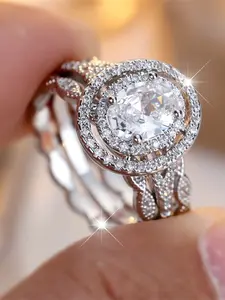 This round stone three-piece ring set is made of synthetic white k zirconia, which is fashionable, elegant and simple. It is suitable for women to wear during travel, wedding and parties, Fashion Engagement Rings