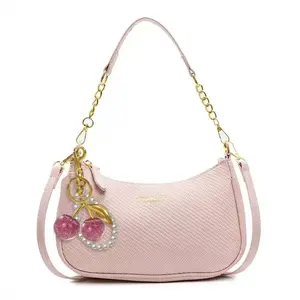 New classic fashion shoulder bag with a cherry pendant charm; women’s crescent-shaped crossbody bag; 2026 spring new arrival; elegant cherry pendant crossbody bag; delicate girls’ handbag; lightweight fashionable small top-handle bag; chain-strap commuter