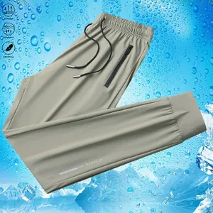 Men’s ice silk casual athletic long pants for spring and summer fitness training and running—breathable quick-dry joggers with zippered pockets and a drawstring waist—suitable for golf, fishing, basketball, camping, gym workouts, and beach runs.