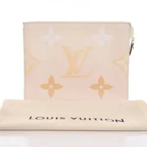 Pre-owned Louis Vuitton Calfskin Leather Toiletry Bags Empriente Leather By the Pool Collection Toiletry 26 in Cream Saffron Calfskin with Gold Toned Hardware