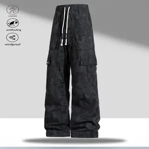 A pair of multi-pocket casual pants, featuring a practical everyday style with an adjustable drawstring waistband, suitable for different waist sizes. The multi-pocket design conveniently stores small items, while the fit is comfortable and flattering for