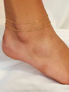 The elegant double-layer copper bead anklet is perfect for women. The adjustable stainless steel chain is Bohemian in style and versatile for casual wear or parties