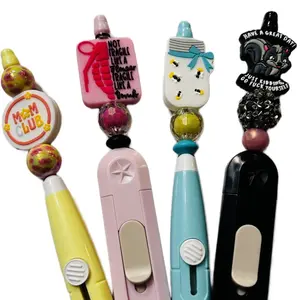 Live claim: Beaded Box Cutter - Multicolor Handle, Durable Blade, Ideal for Cutting, Portable Design, Perfect for Home & Office Use