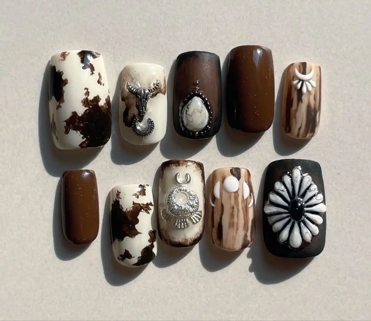 Western Aesthetic Short Square Press-On Nails Set, Medium Brown Cow Print Design with Turquoise Gemstones, Bull Skull Metal Charms