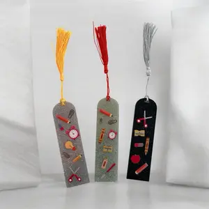 Teacher Themed Bookmarks with Colorful Tassels and Educational Icons for Book Lovers