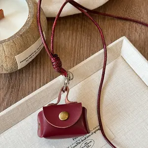Vintage Leather Earphone Pouch Necklaces for Stylish Everyday Looks, Retro Leather Coin Earphone Bag Necklace: A Must-Have Fashion Accessory men chain pendant dainty gold popular keychain christian exquisite statement keyring punk car key unisex all-match