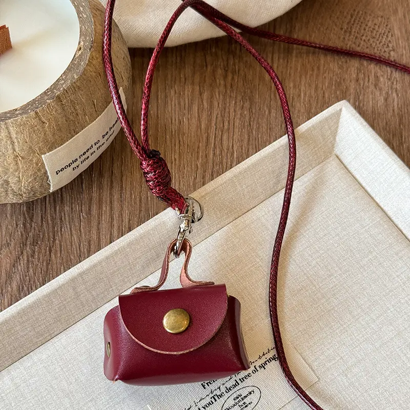 Vintage Leather Earphone Pouch Necklaces for Stylish Everyday Looks, Retro Leather Coin Earphone Bag Necklace: A Must-Have Fashion Accessory men chain pendant dainty gold popular keychain christian exquisite statement keyring punk car key unisex all-match