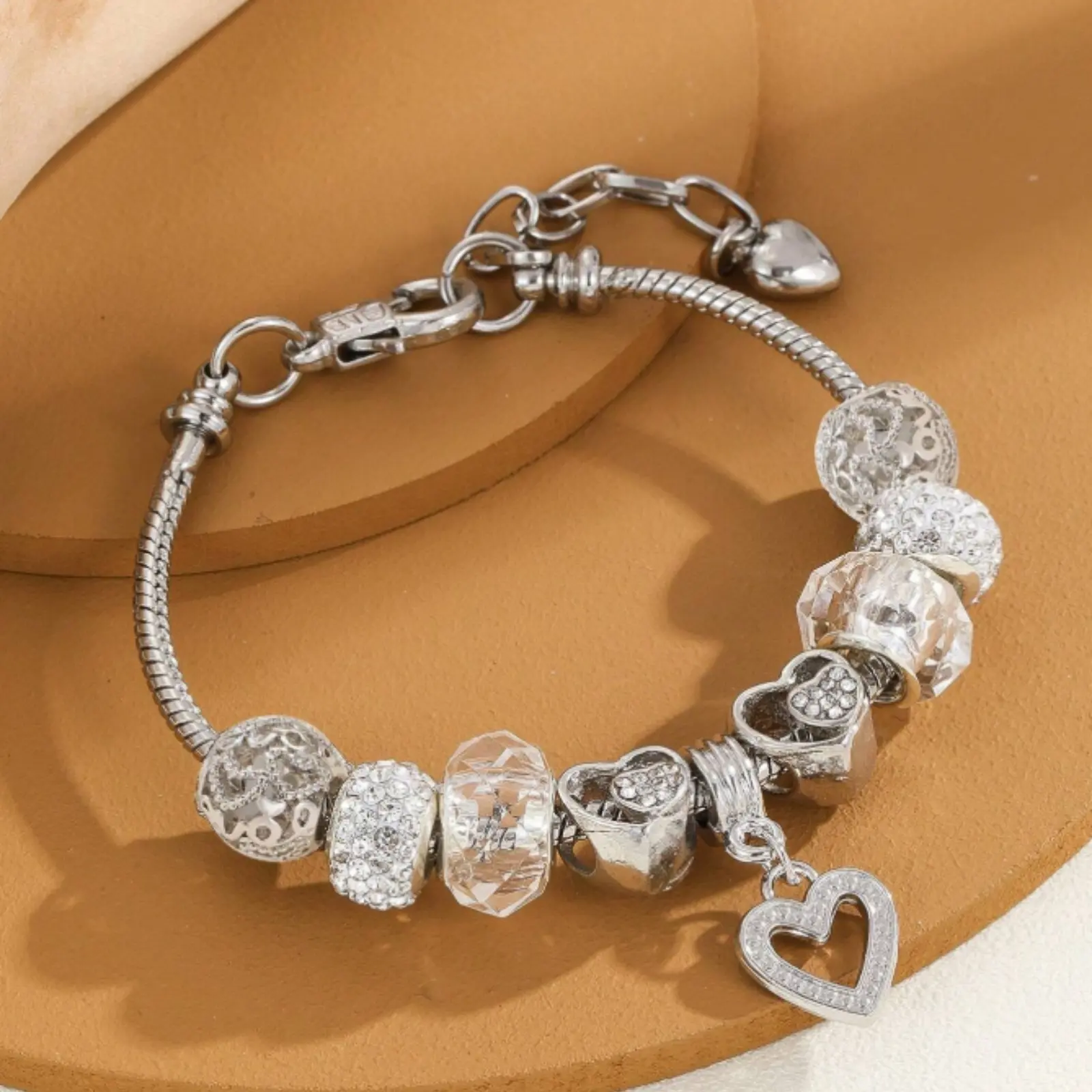 Heart shaped hollow inlaid beads decorated bracelet, suitable for women's daily wear on Valentine's Day