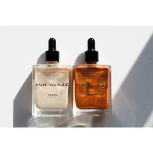 SUN GLAZE, A SHIMMER OIL SUN GLAZE, A SHIMMER OIL