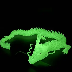 Green glowing 3D-printed dragon