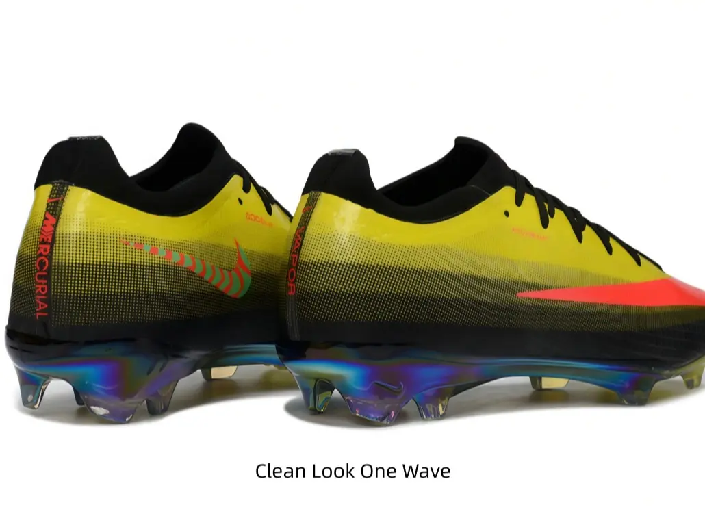 Thin breathable gradient woven upper, slim low-cut ankle collar, flat tight lacing system, iridescent translucent multi-stud traction outsole for firm natural grass surfaces