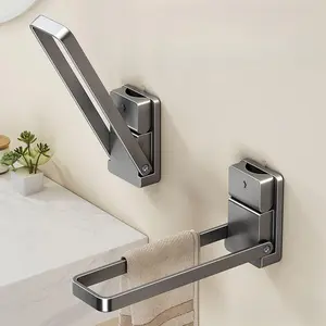 A Foldable Towel Rack with a Suction Cup, Suitable for Hanging Hand Towels at The Sink, Featuring a No-Drill Design for Storing Towels, Jewelry, Headbands, And Other Items in The Bathroom.