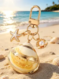 1pc Asymmetrical Shell, Starfish, And Conch Wallet Pendant Decorative Keychain, Nautical Keychain, Ocean Element Conch And Starfish Keyring, Bag Charm For Girls, Vacation Style Accent Piece, Versatile Commuter Decoration, Oceanic Elements, Nautical Theme