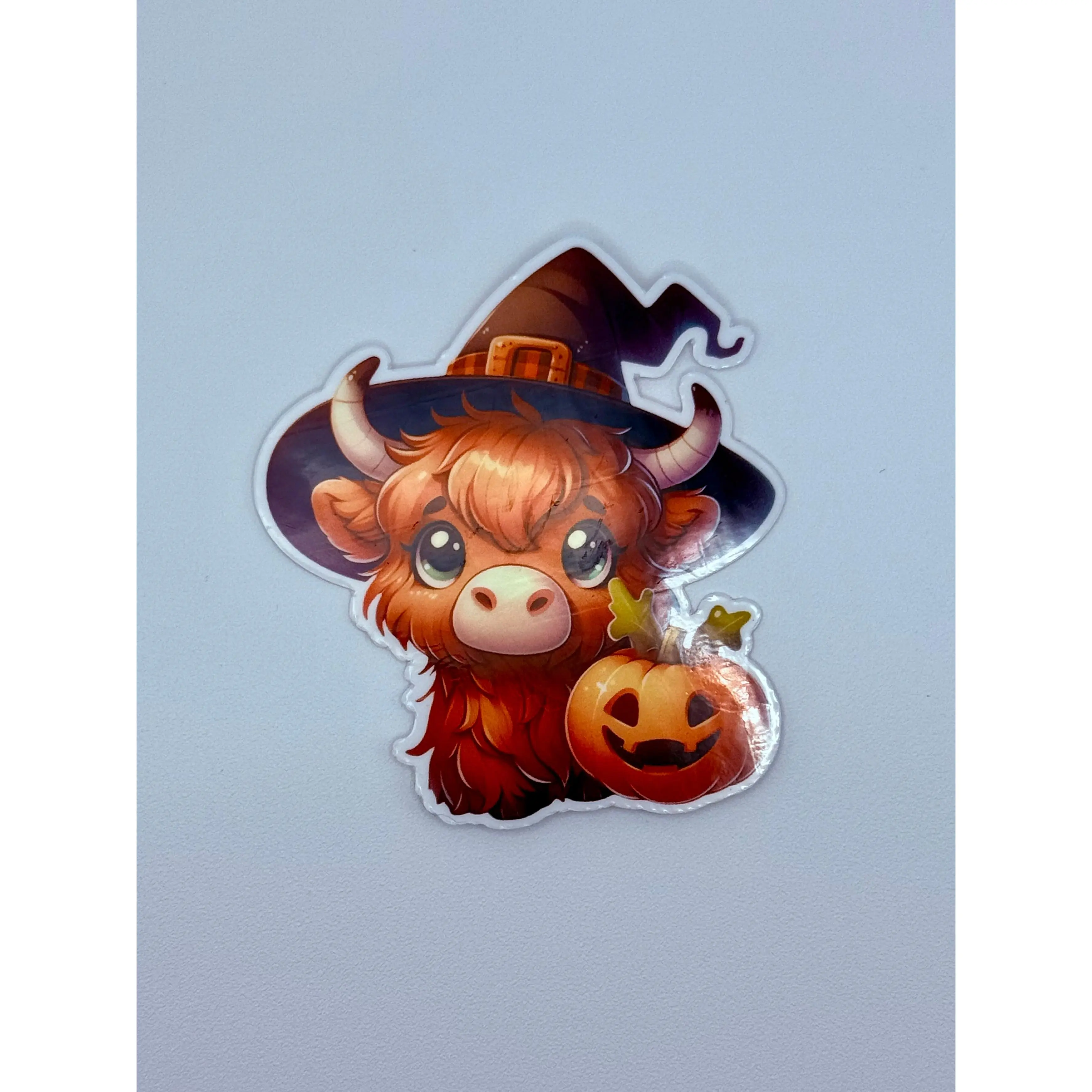 Highland Cow Witch Sticker – Cute Halloween Pumpkin Vinyl Decal, Spooky Fall Aesthetic, Kawaii Cow Sticker for Laptop & Water Bottle