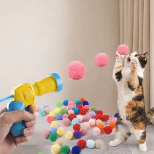 Interactive Pet Toys for Cats and Dogs Fun Pompom Launcher & Colorful Balls for Engaging Playtime Versatile and Easy to Use