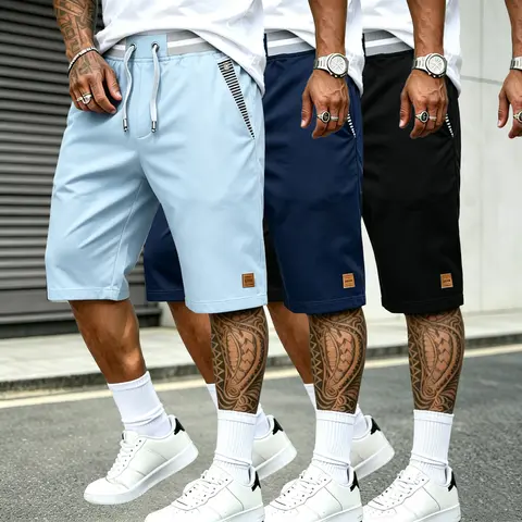 Men’s summer color-block casual shorts, black-and-white double-stripe ribbed fabric, elastic mid-rise waist, paired with gray-white dual drawstrings, flat lock-edge straight cut with a flat hem. Suitable for light casual wear that’s easy to match, suitabl