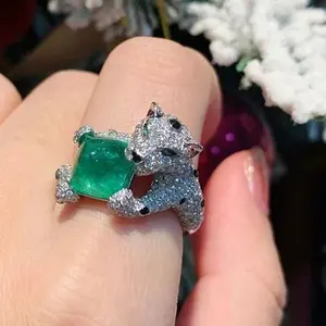 green A luxurious hand polished Moissanite ring paired with green zircon. Exquisite craftsmanship. Sparkling Moissanite and green zircon. Master level aesthetic design. Excellent quality. Brilliant and radiant. High quality hand polished.